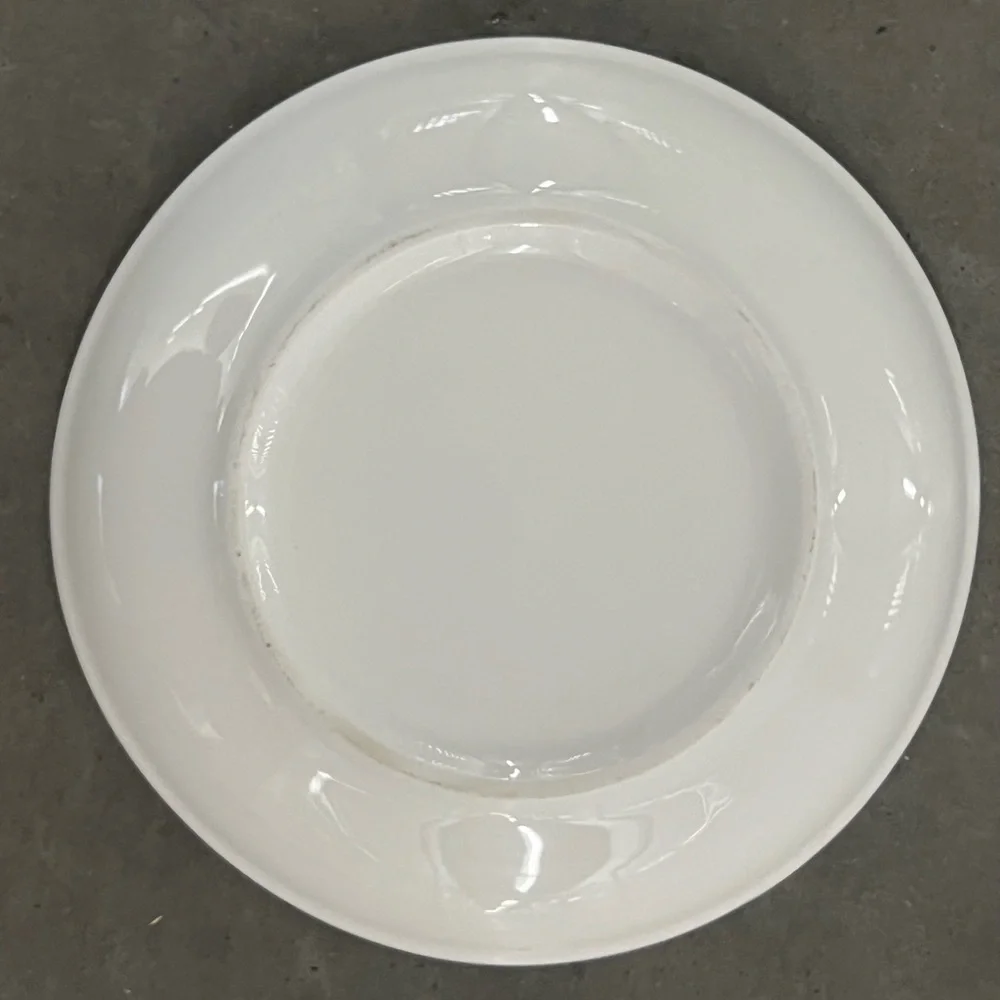 White Ceramic Dog / Cat Bowl with Black Paw. 6” Diameter x 1” High.